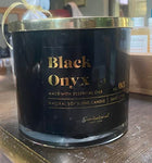 Candle Black Onyx Scents Ambered Violet teaf, Soft Cashmere, Cedar and Hints of Brushed Suede Nestle Over Sandalwood. 26 OZ